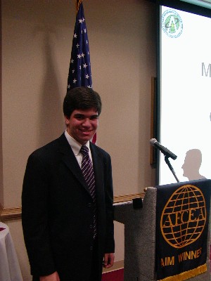 Joshua Cohen, a recipient of the chapter's $500 award at the Georgia Junior Science and Humanities Symposium, receives recognition at the March meeting. 